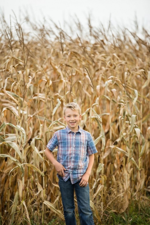 portrait in front of corn field