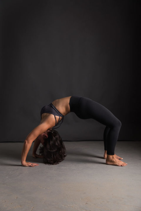 Commercial photography of a yoga teacher in studio