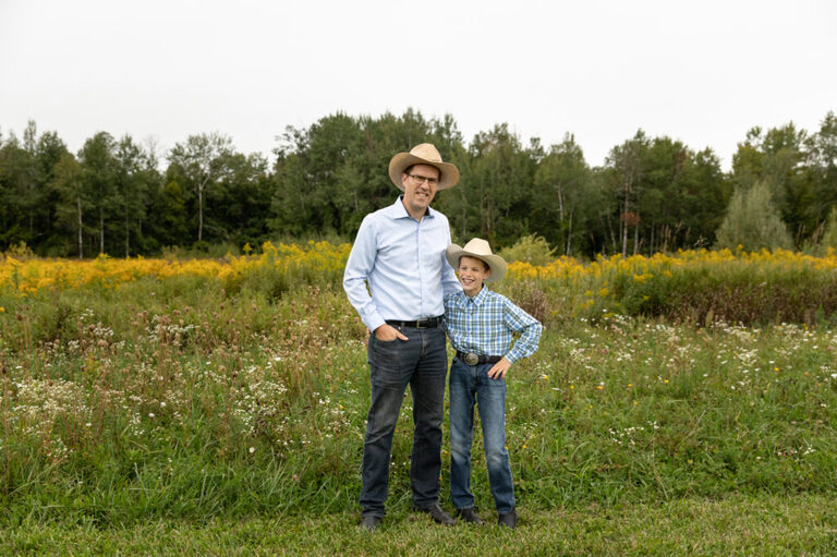 Father and son in cowboy hats